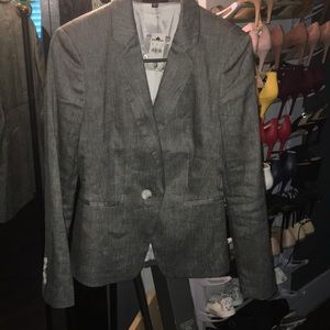 Medium gray colored blazer.